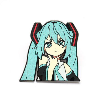 Hatsune Miku pin badge: blue twin tails, black outfit, red headphone accents