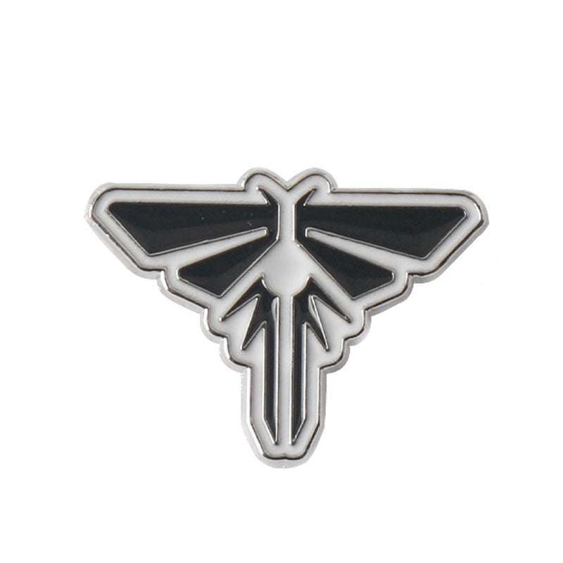 The Last of Us Clicker stage 3 infection pin badge with black wings and silver frame