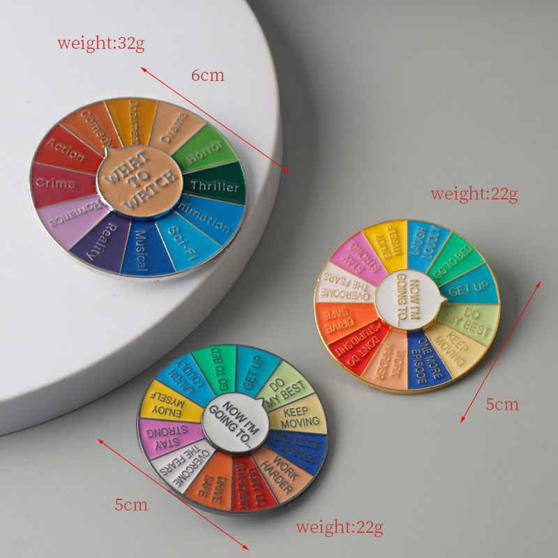 3-pack circular spinner brooches with colorful segments and phrase centers, gold rim