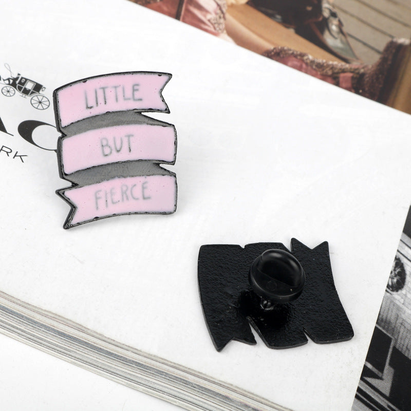 Enamel brooch pin set, pink ribbon banners with black border and text LITTLE/BUT/FIERCE