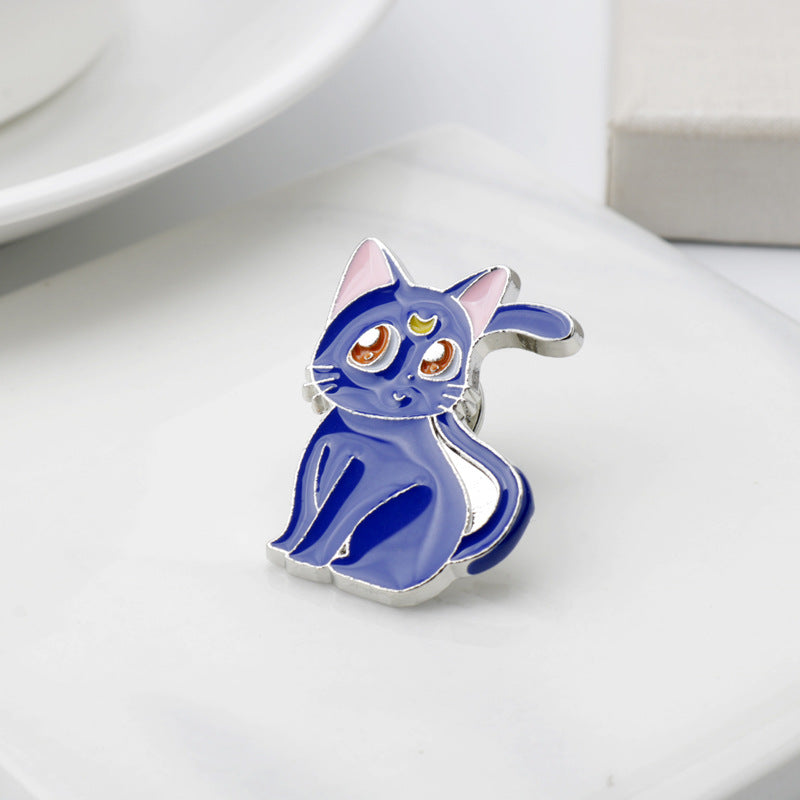 Blaue Luna-Brosche aus Metall mit Emaille und Sicherheitsnadel
