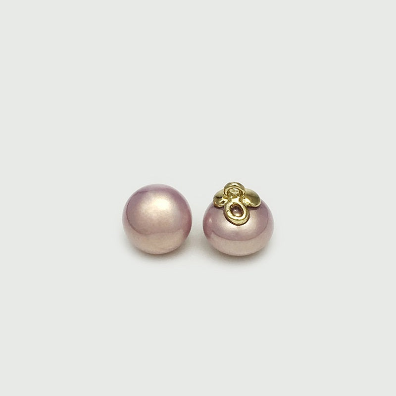 Oval pearl buttons, purple-pink, gold loop, with dark center ring