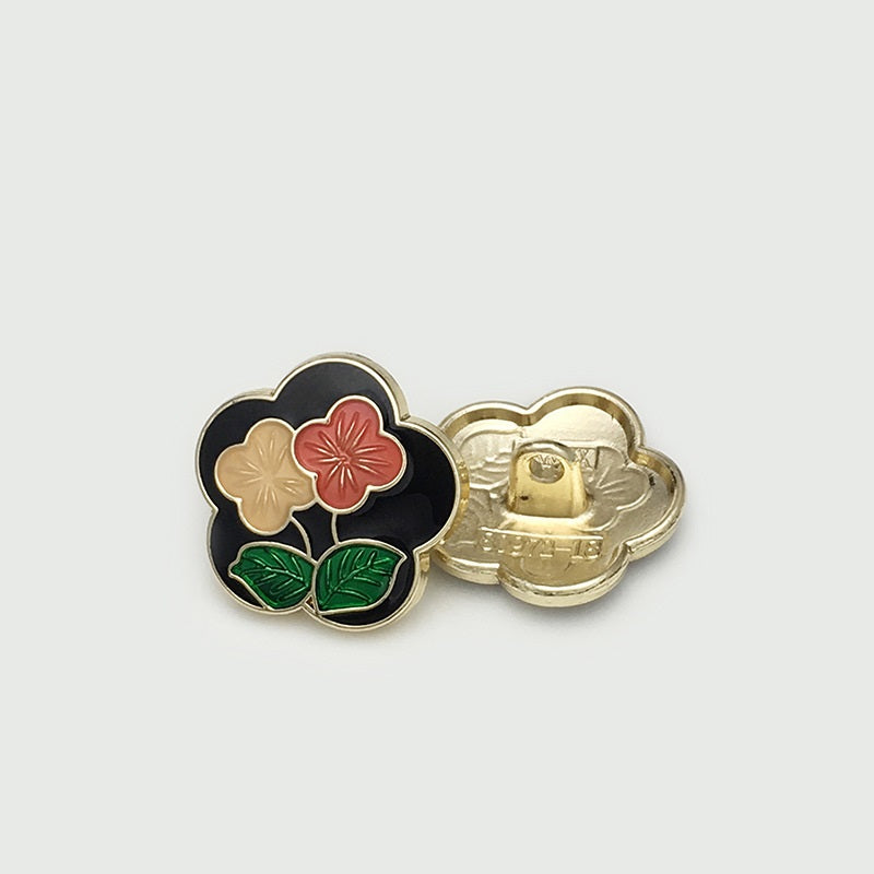 Cloisonné metal button with loop, dark enamel flower cluster with red and beige petals, gold frame