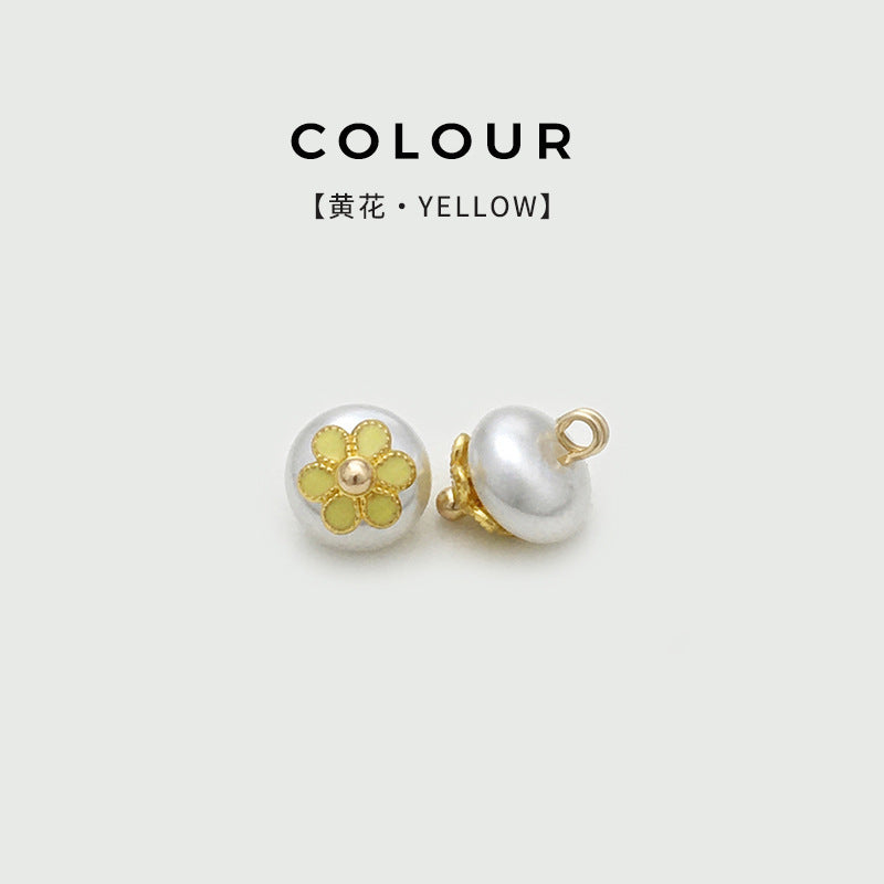 Yellow flower pearl frog button, round front with gold-tone center