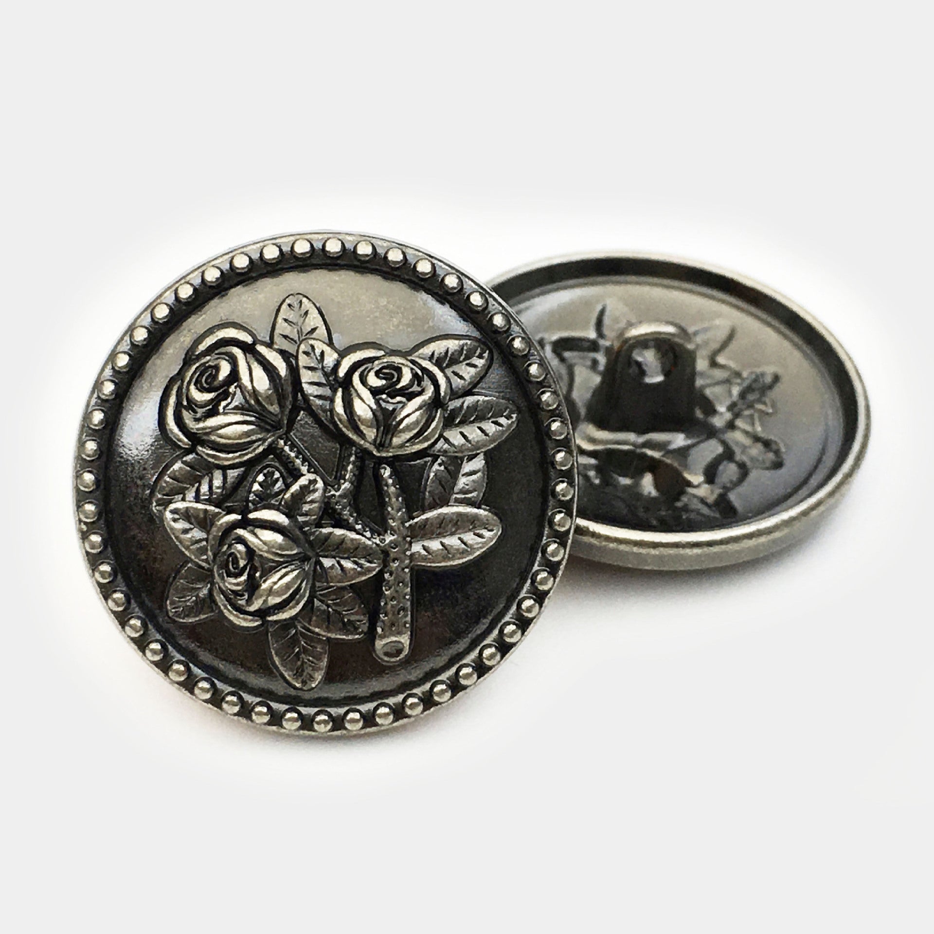 Vintage round rose metal button, bronze/silver finish with engraved roses and leaves, front