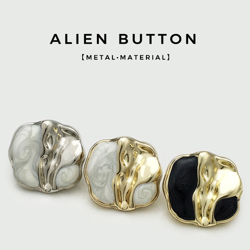 Three two-tone irregular metal buttons: silver-white, gold-white, gold-black