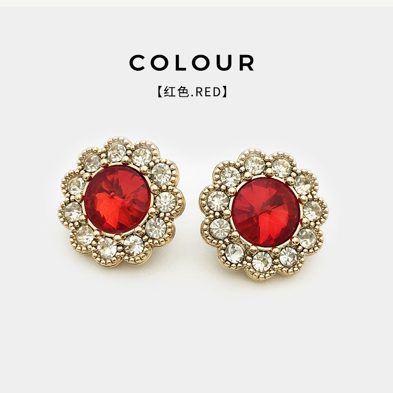 Red round crystal diamond floral shank button, gold-tone prong border