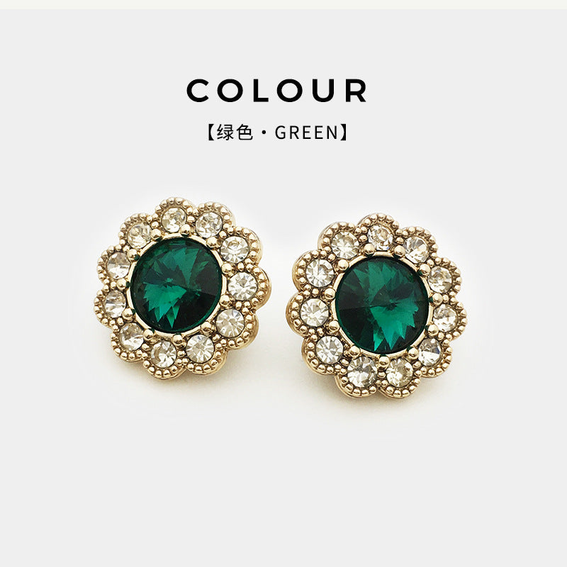 Green round crystal diamond floral shank button with gold-tone rhinestone setting
