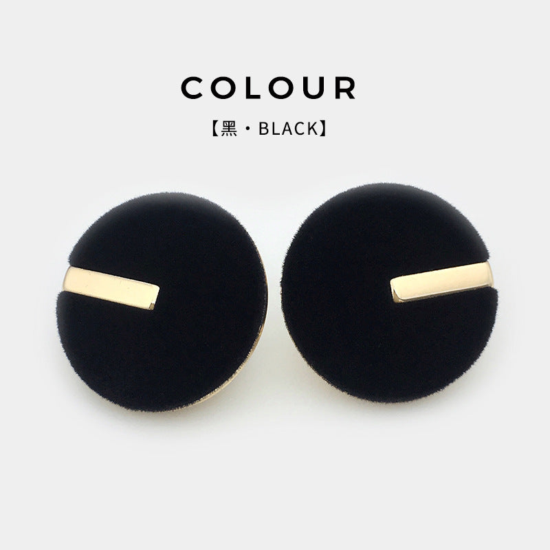 Black round velvet buttons with gold metal bar front