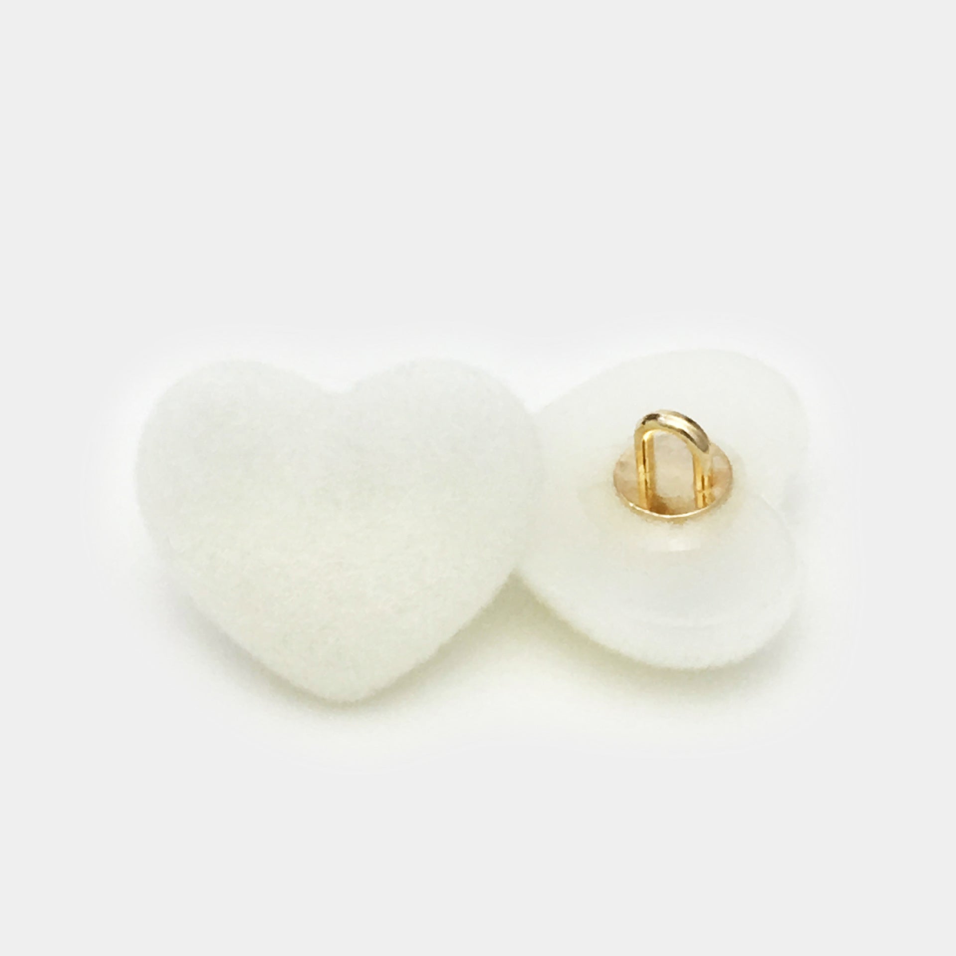 White heart button, velvet resin top with metal shank on back plate