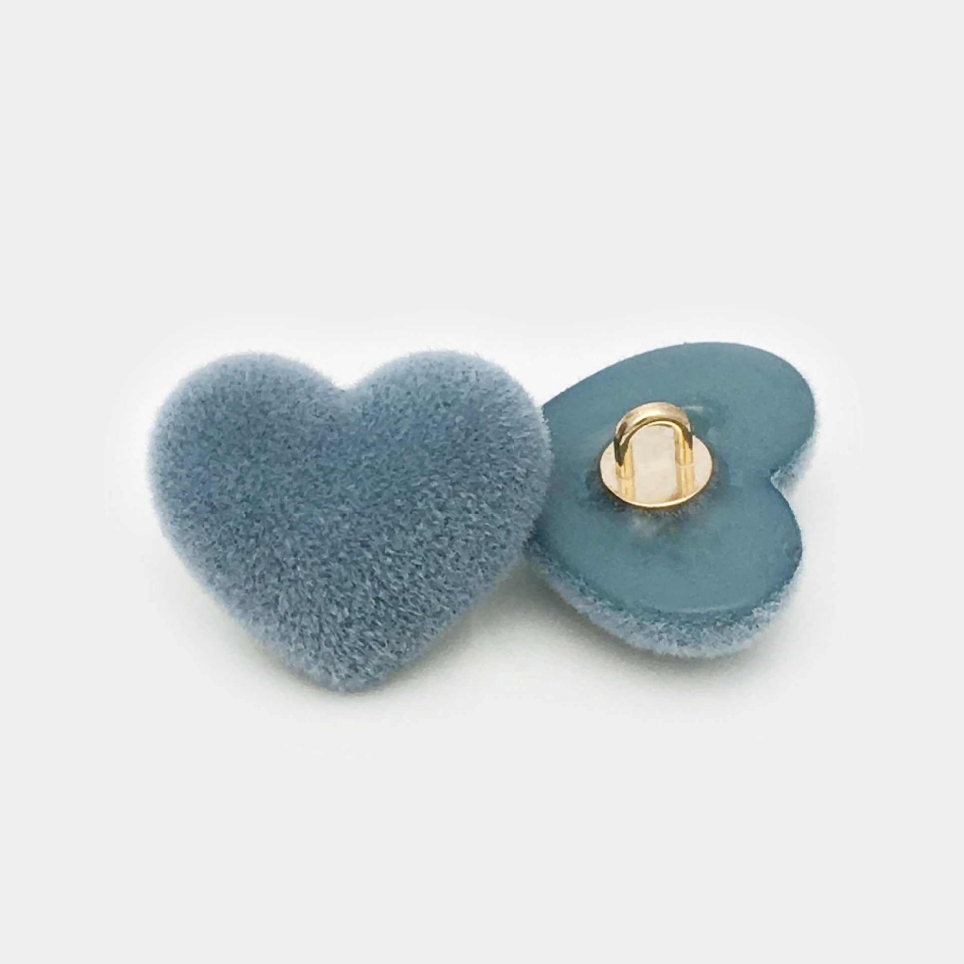 Blue heart button with velvet resin finish and metal shank on back plate