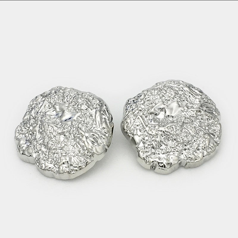 Irregular pleated metal shank buttons, silver finish, domed textured design, pair
