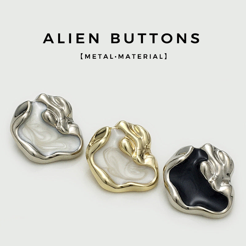 Irregular metal buttons set: silver, gold, and silver with black insert