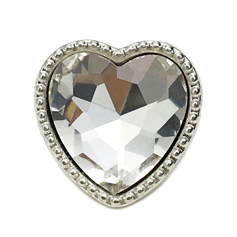 Heart-shaped metal button with faceted diamond-look crystal in a silver setting