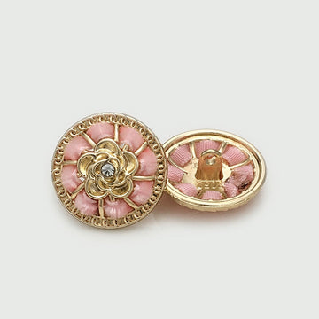 Round pink floral gold metal button, ornate filigree and central rhinestone detail