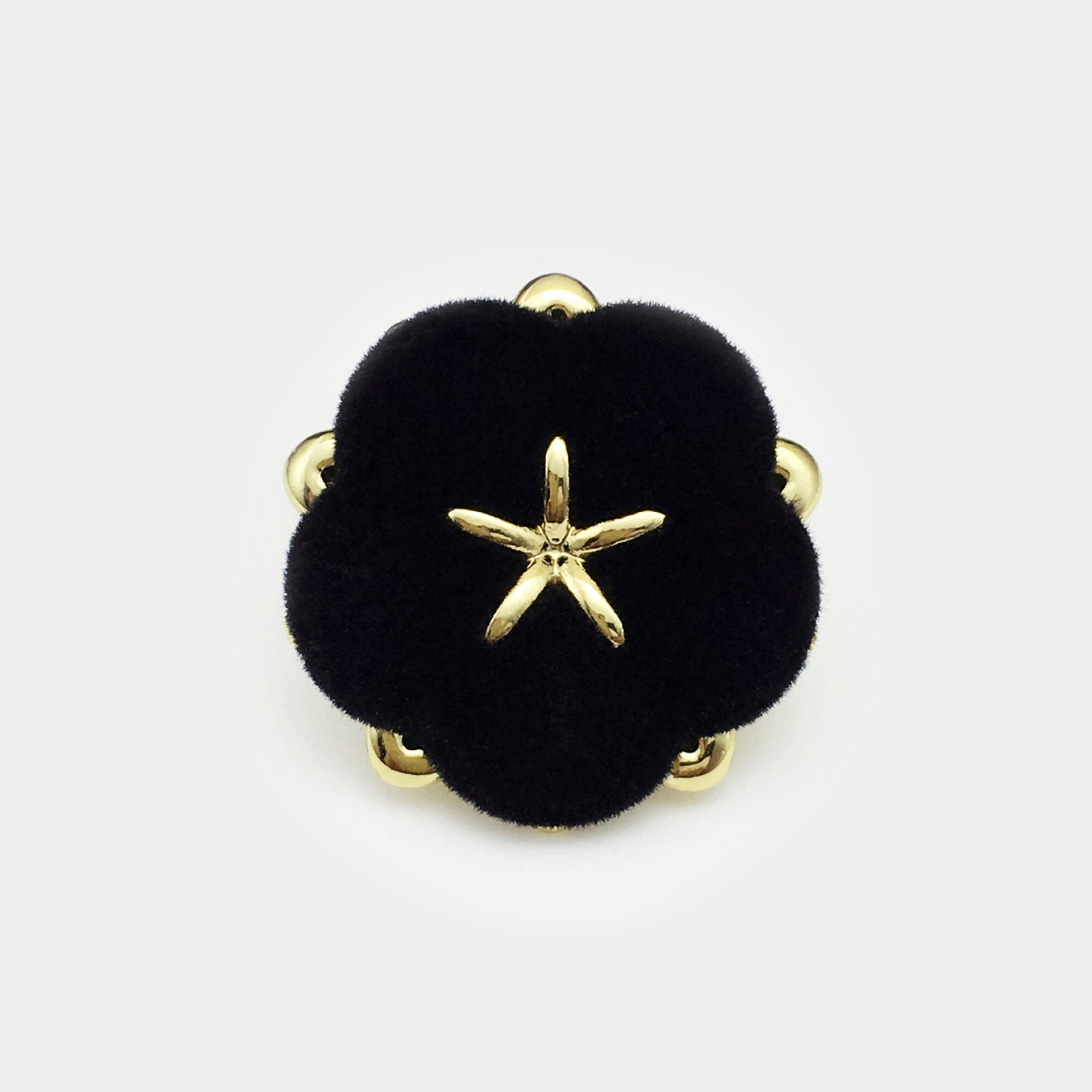 Velvet floral button, black with gold star center and four metal shanks