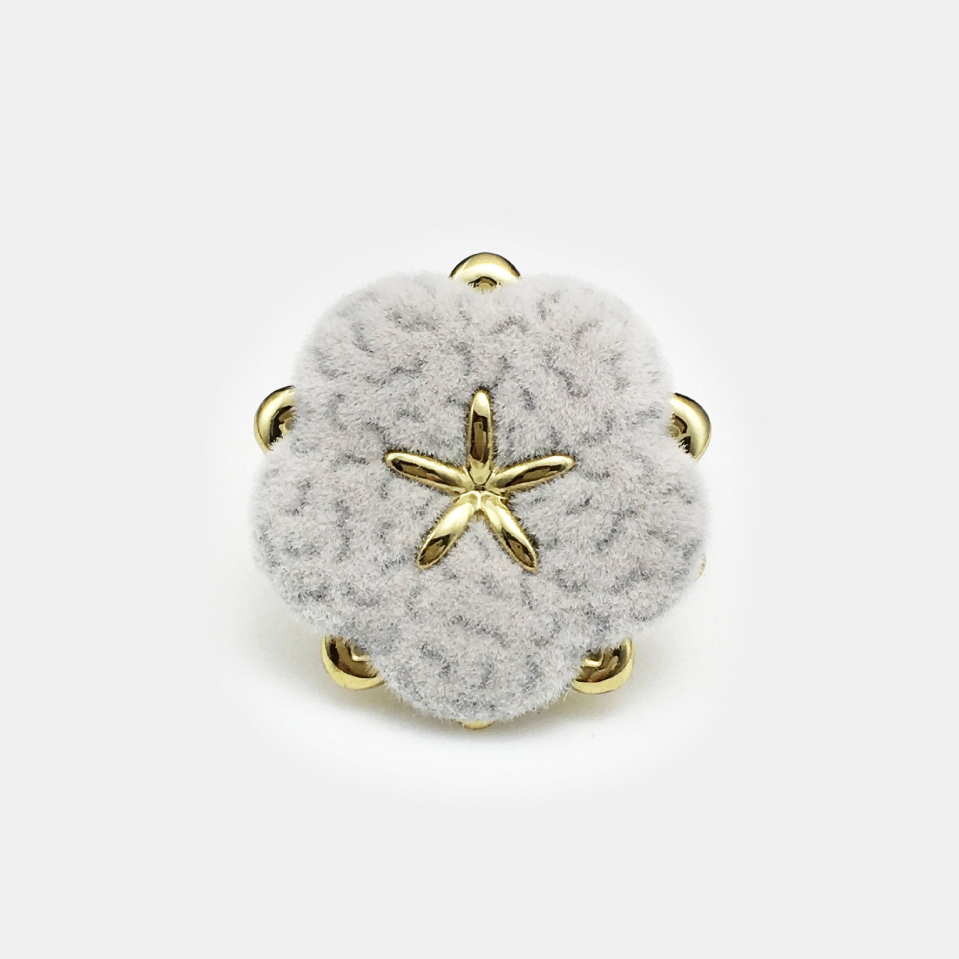 Velvet floral button, white with gold star center and four metal shanks