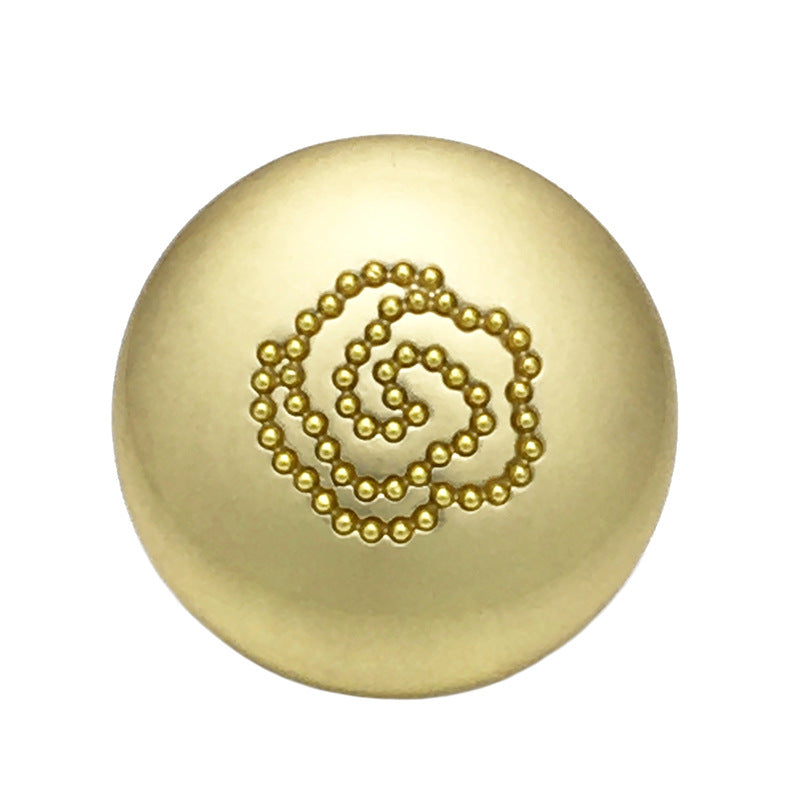 Matte gold rose metal mushroom button with beaded swirl design, front view