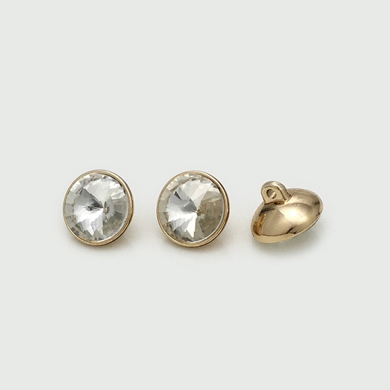 Gold-tone metal buttons with clear crystal fronts and attached shank backs
