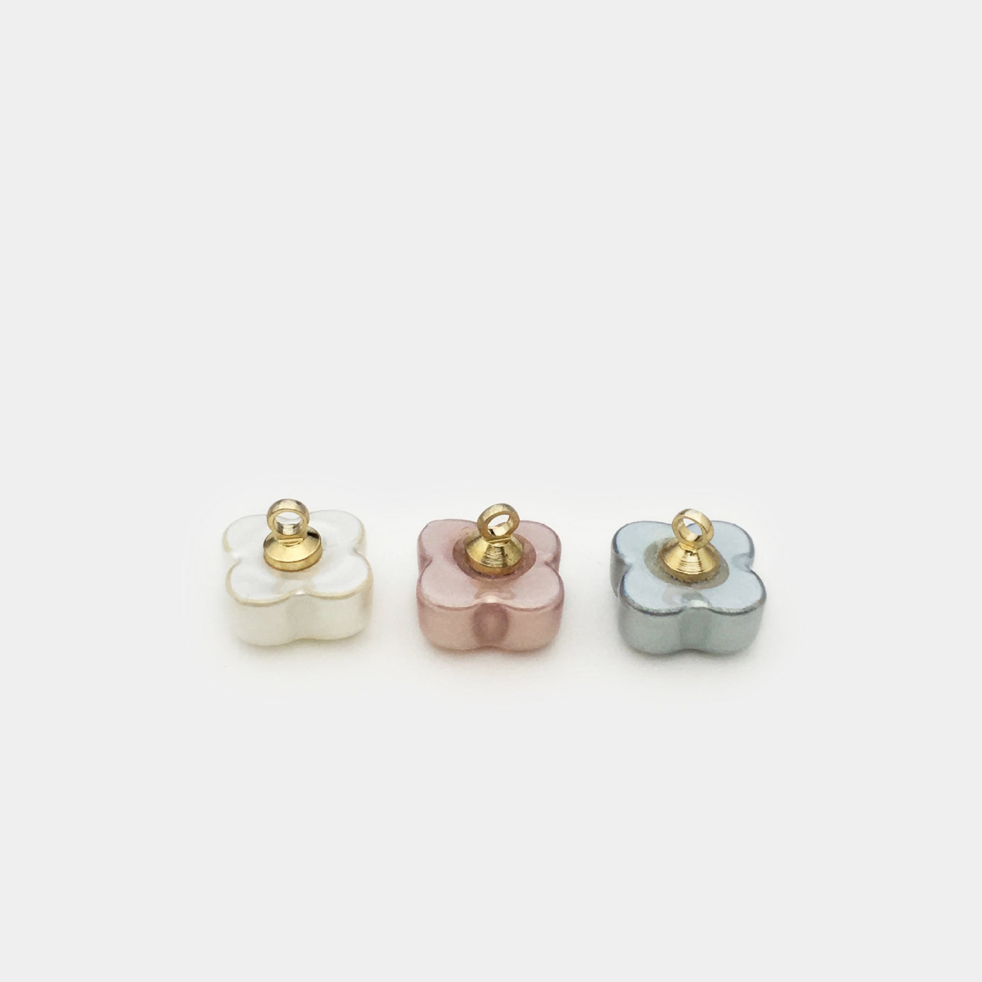 Clover shirt buttons with metal shanks: white, rose pink, light blue-gray