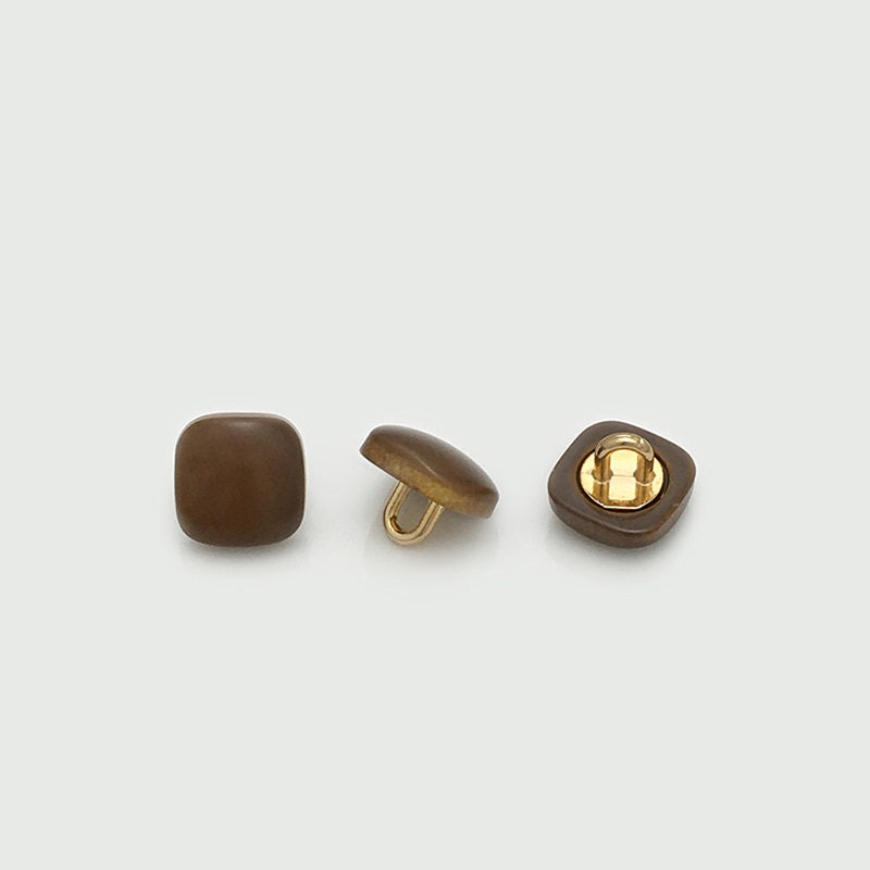 Square wood button set: brown front, metal shank underside, back view