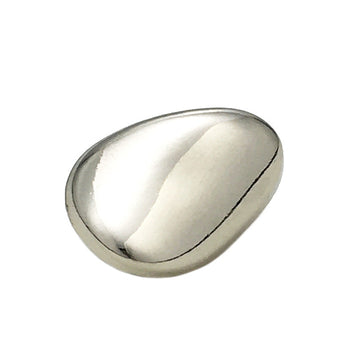Silver irregular metal button with shank, oval domed front, close-up