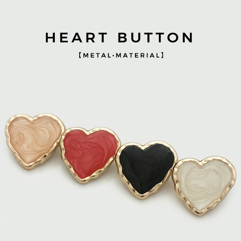 Assorted heart-shaped enamel metal buttons: beige, red, black, white with gold edges