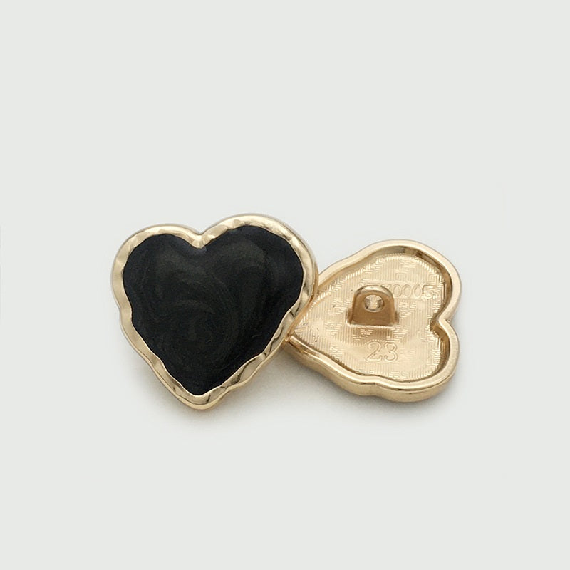 Heart-shaped enamel metal button set: black front with gold-tone back and 1-hole prong