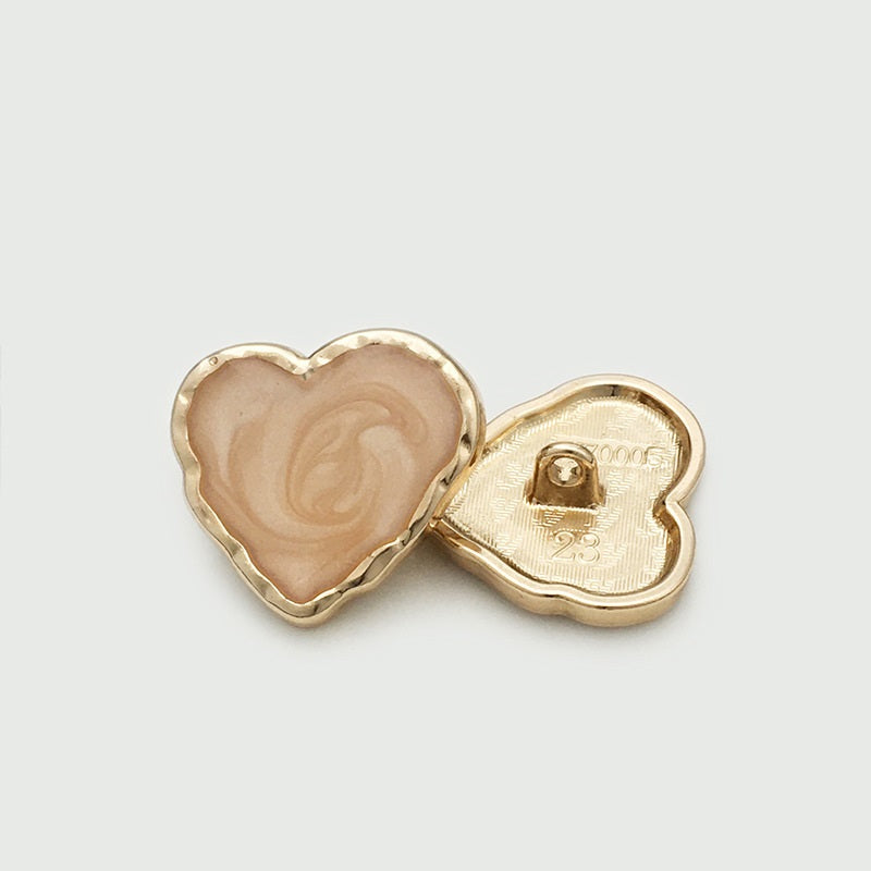 Heart-shaped enamel metal button set: beige/pink front with gold-tone back and 1-hole prong