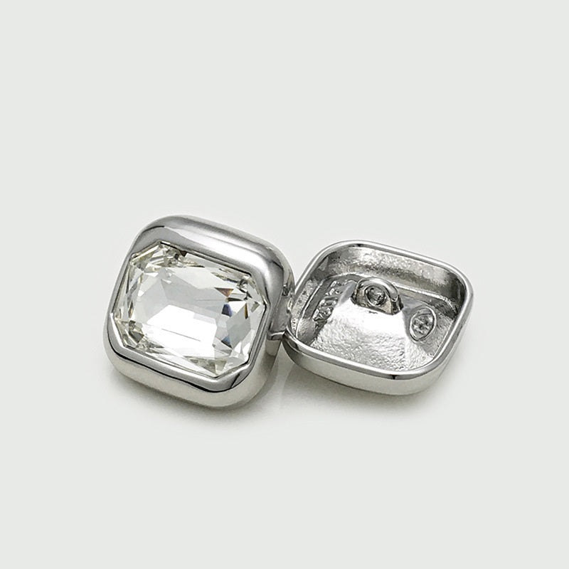 Silver square crystal button, back view with two holes and clear faceted gem