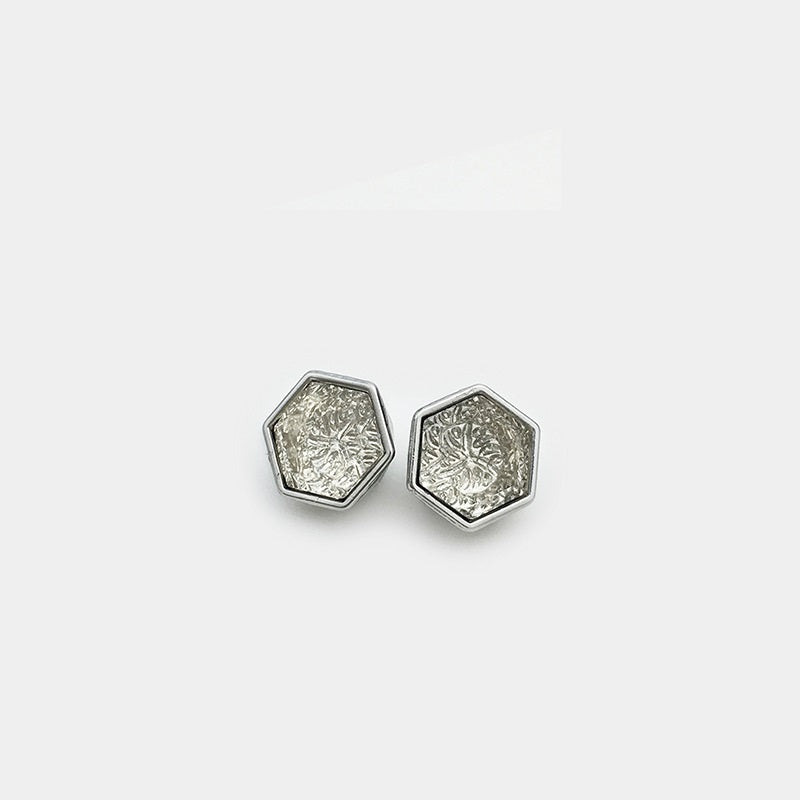 Hexagonal gem-studded buttons, silver metal frames with silver textured panels