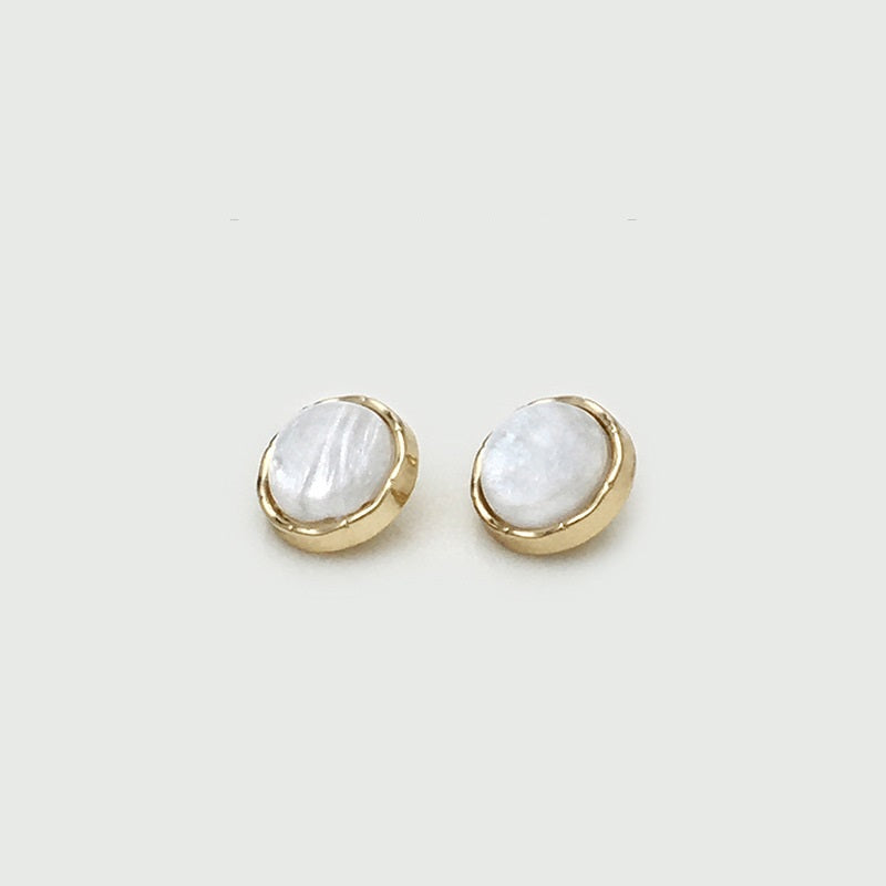 Two 11mm round shirt buttons, gold rim with white pearlized finish