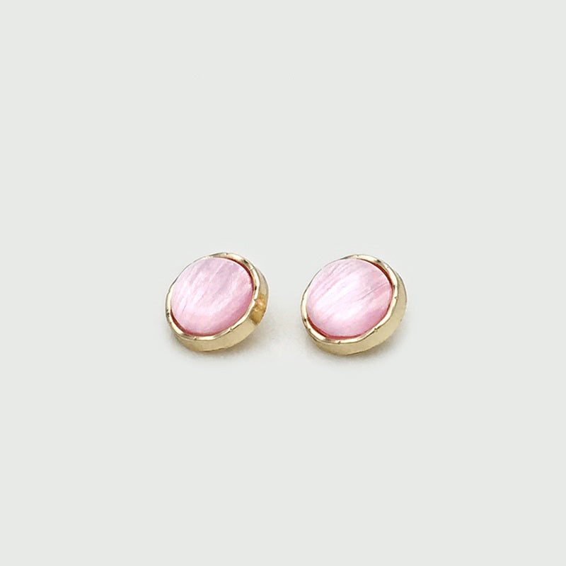 Two 11mm round shirt buttons, gold rim with pink pearlized center