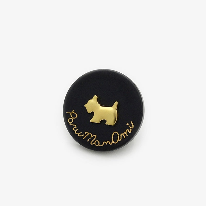 Black round resin-metal dog button with gold dog silhouette and script lettering