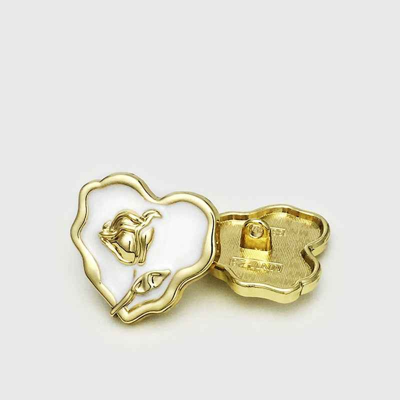 25mm rose heart metal button, gold frame, white center; visible back with shank