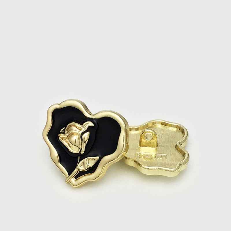 25mm rose heart metal button, gold frame, black center; visible back with shank