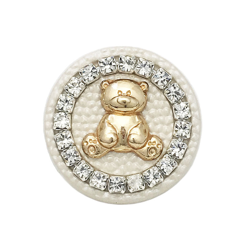 Ivory round bear metal button with crystal-look border and gold embossed bear figure