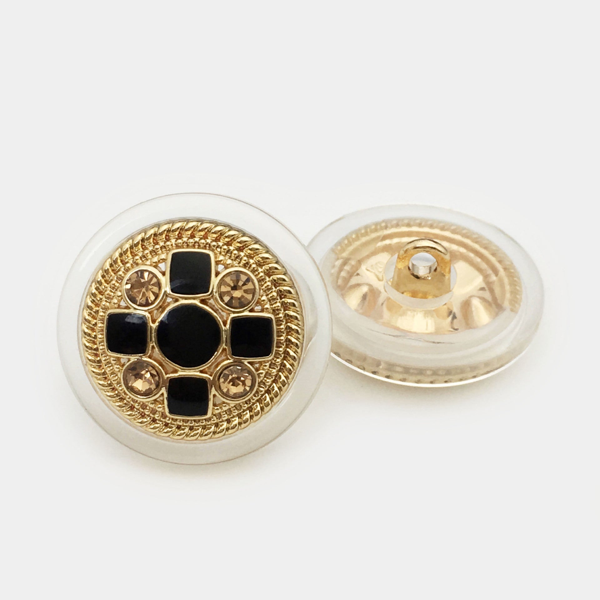 Transparent vintage cross button: black front in gold bezel with clear back