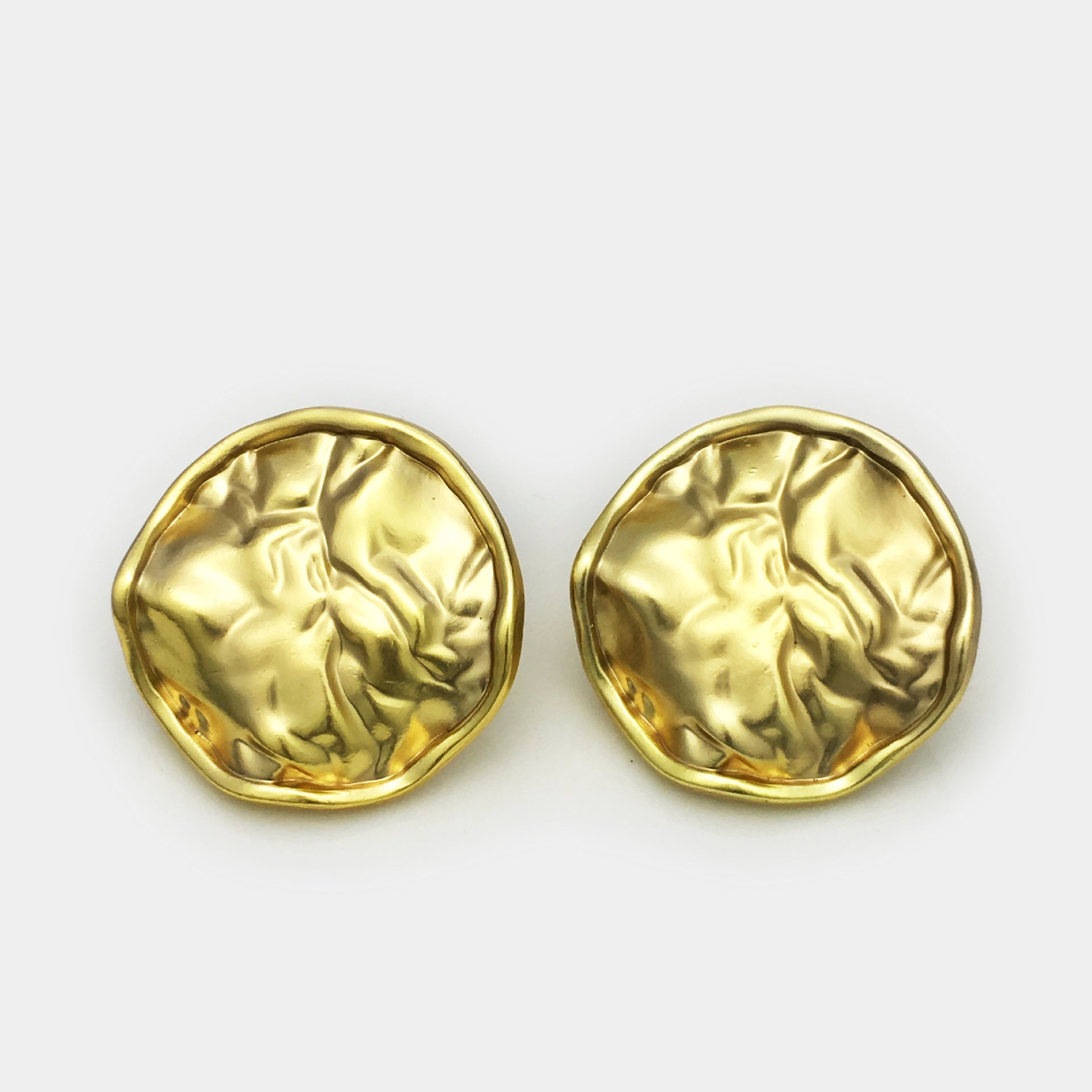 Pair of antique gold pleated metal buttons, round front with crimped raised texture