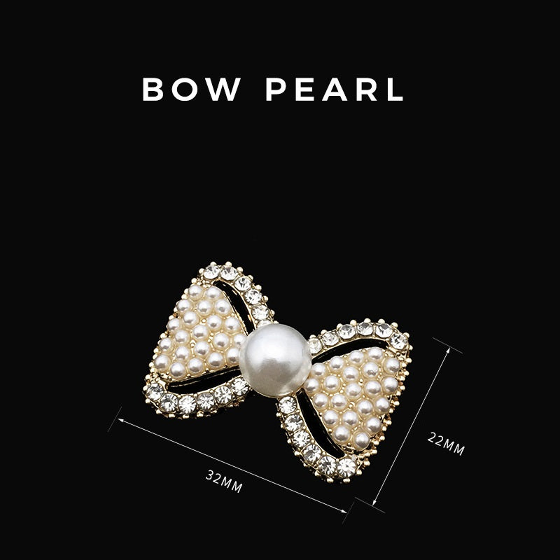 Gold 3D Bow button: pearl beads and clear rhinestones around bow, center faux pearl