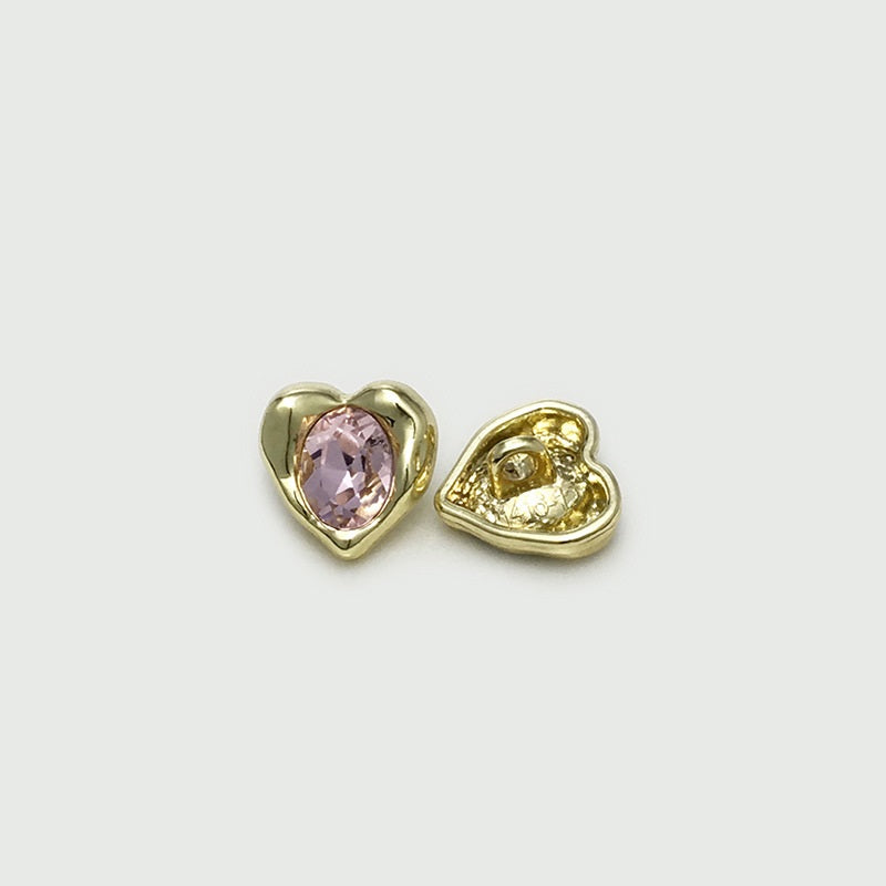 Gold-tone heart cuff button with light pink gem, shown front and reverse