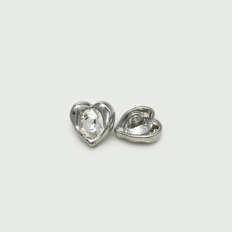 Silver-tone heart cuff button with clear gem, shown front and reverse