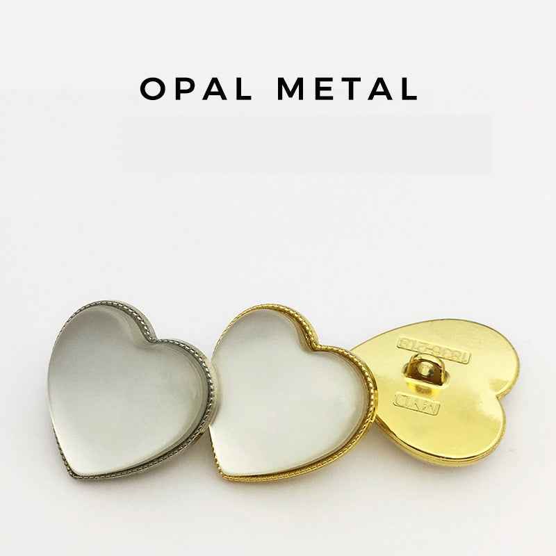 Heart decorative buttons: silver and gold-tone fronts with visible metal back plate
