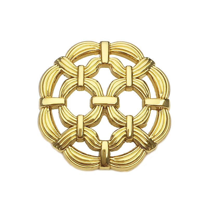 Gold hollow metal button with shanks, round looped filigree design