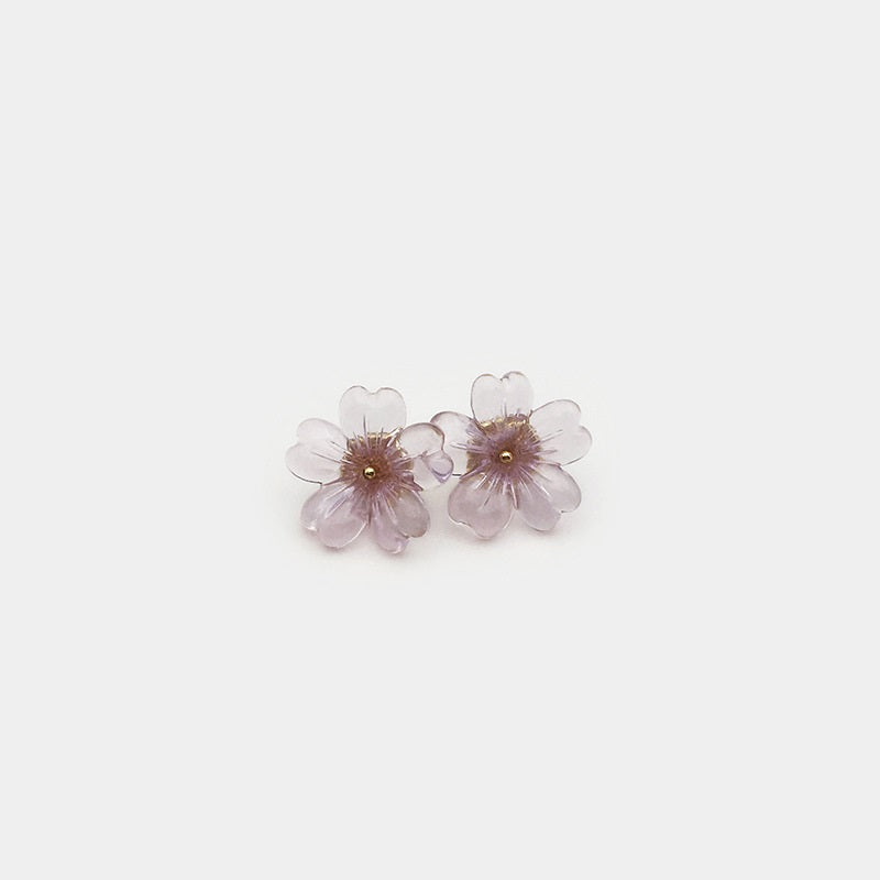 Pair of 11mm transparent floral resin shirt buttons, soft pink tinted petals