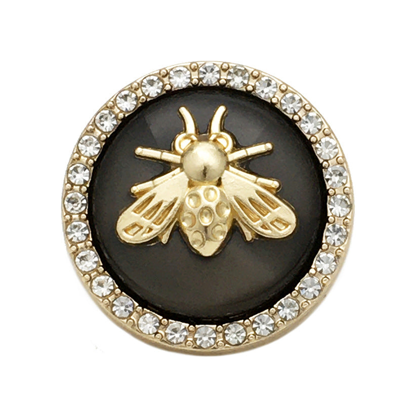 Black bee rhinestone metal button, gold-toned bee center and wings, round