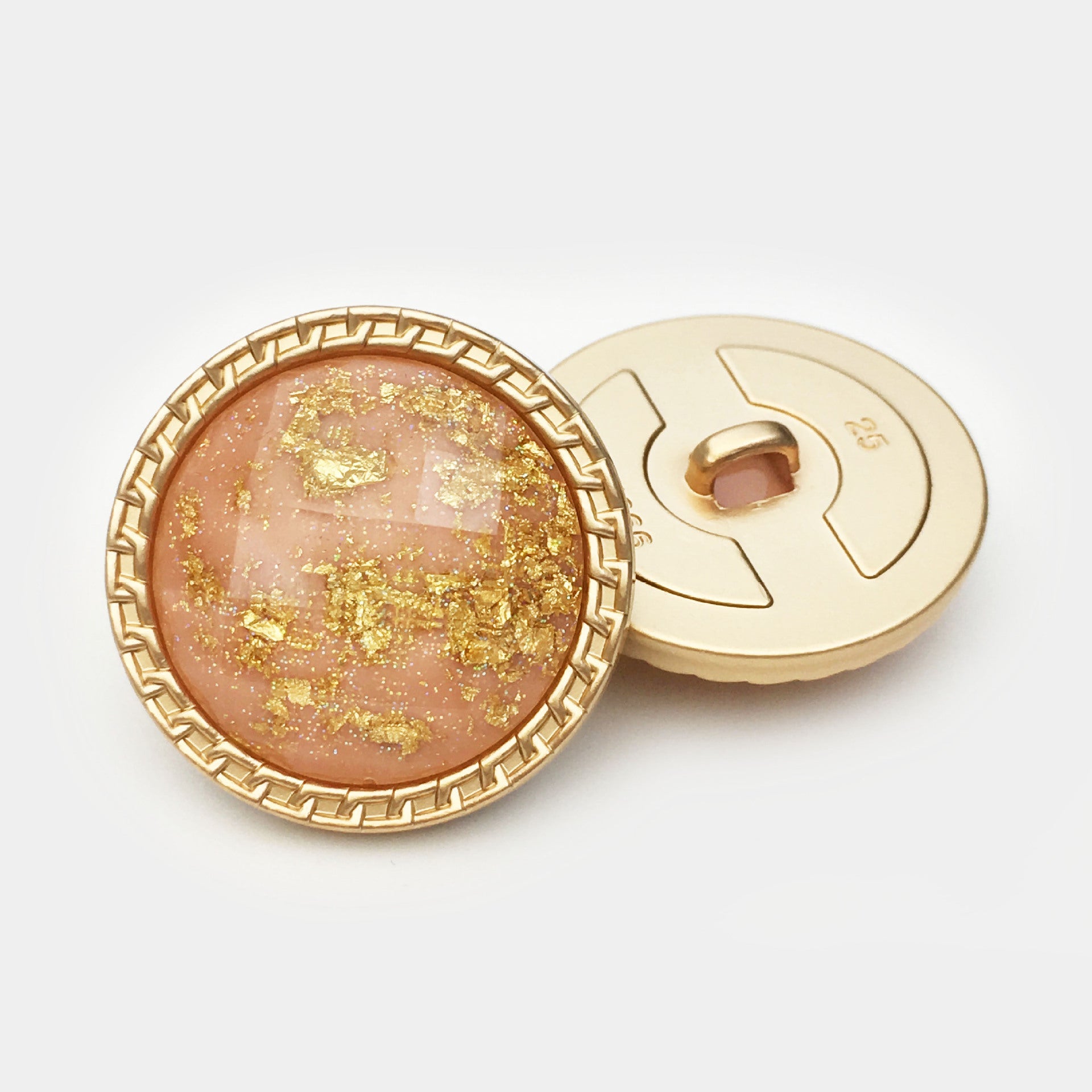 Pink 25mm gold foil water ripple resin button front with gold rim and back