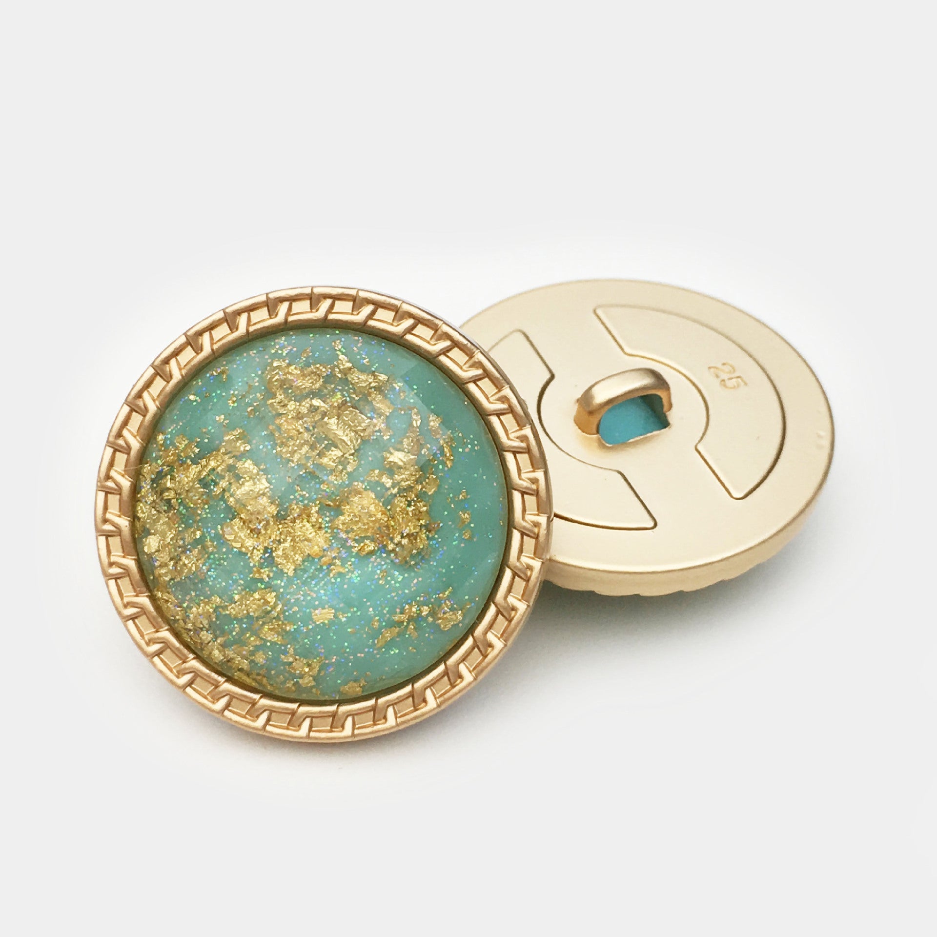 Green (teal) 25mm gold foil water ripple resin button front with gold rim and back