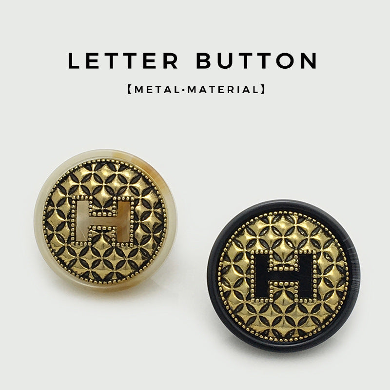 Set of round letter H buttons: beige and black with gold floral border
