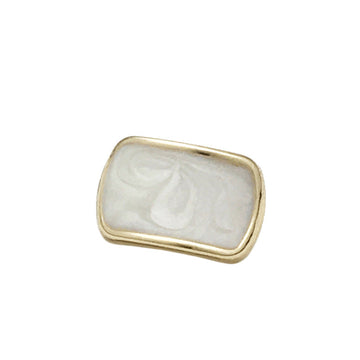 Rectangular gold shirt button, white oil-spotted face, smooth metal edge